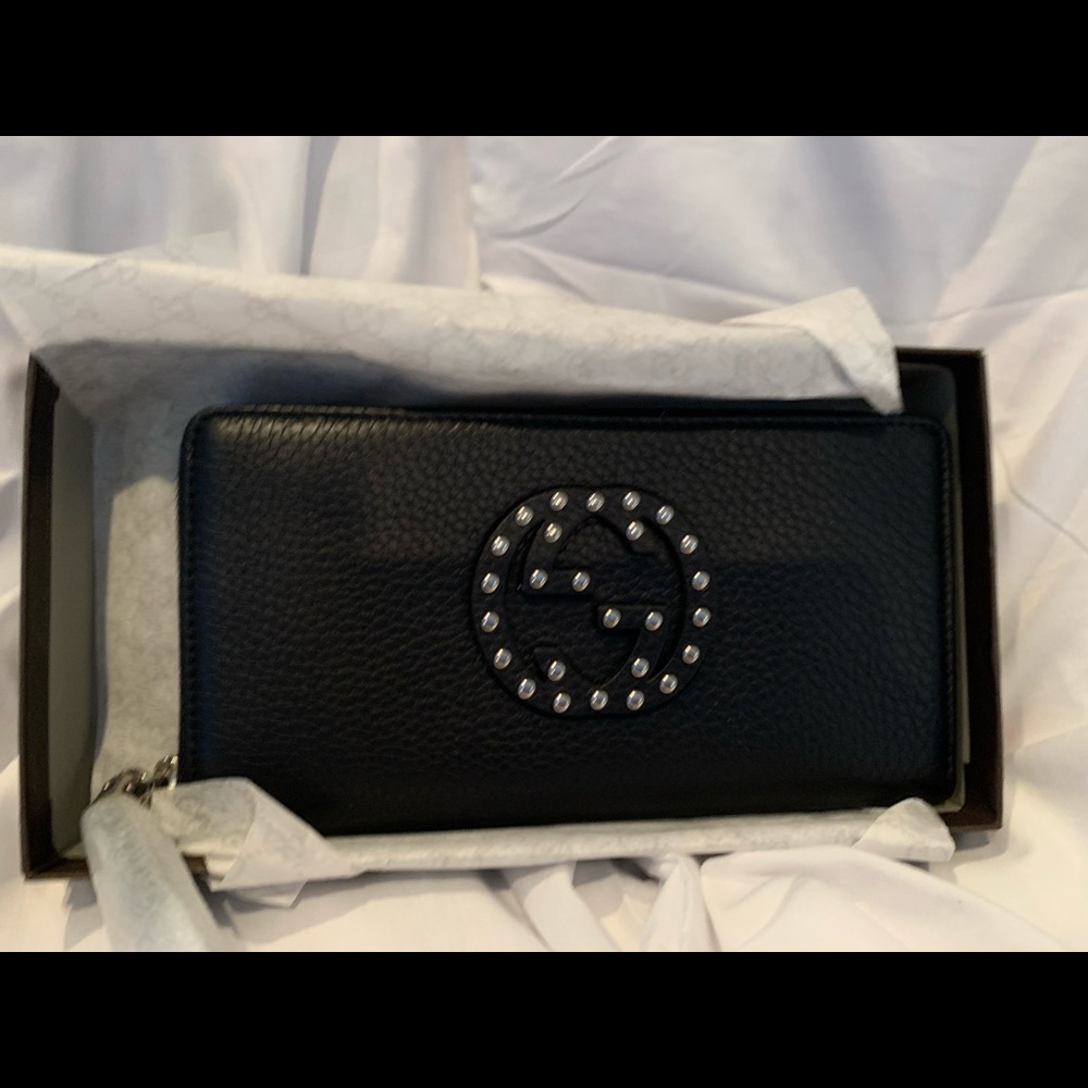 Gucci studded zipper wallet